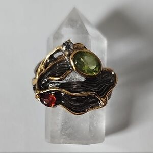 Peridot with White Topaz and Garnet Ring